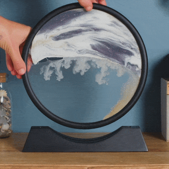 This kinetic sculpture forms landscapes with sand, giving you a mental vacation right at your desk.